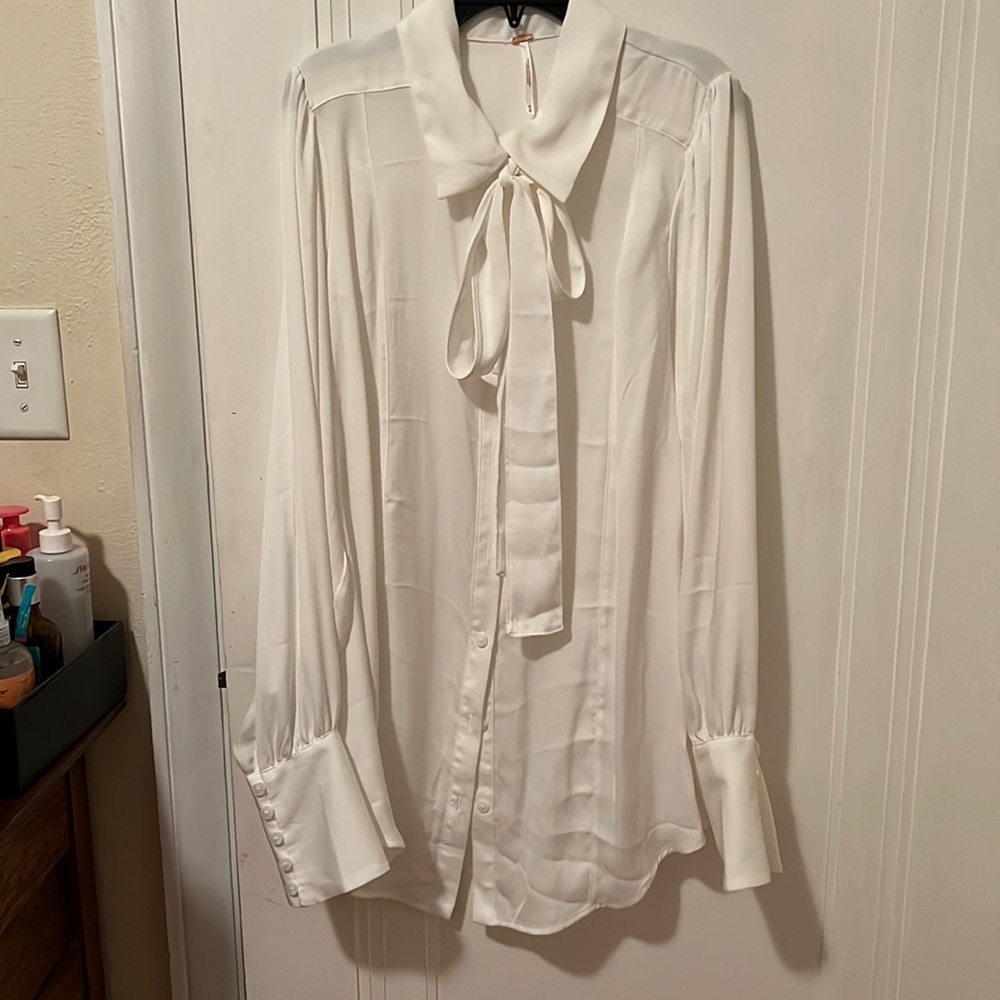 Beautiful free people blouse size medium never worn